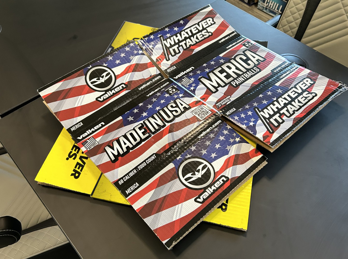 The Merica Mystery Paintball Box laid out on Valken's conference table.